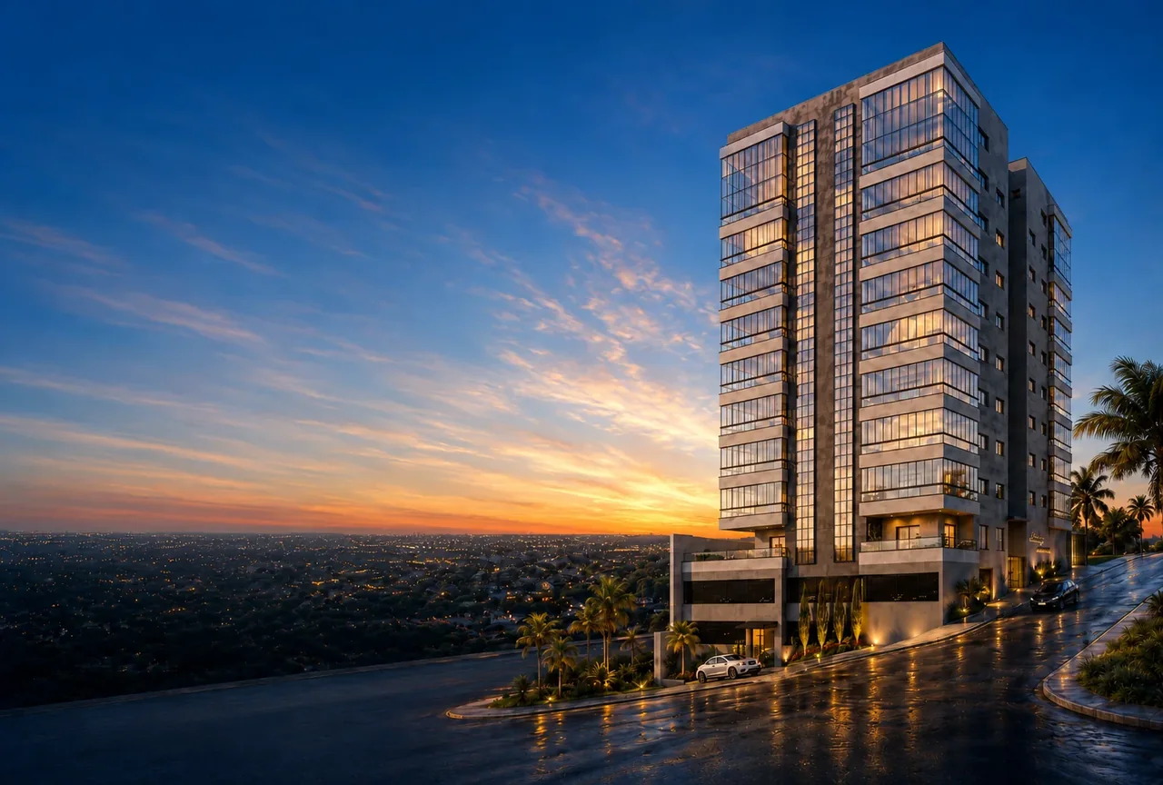 Residencial AltaVille ao entardecer, com as varandas de vidro iluminadas e as luzes de Pouso Alegre no vale ao fundo